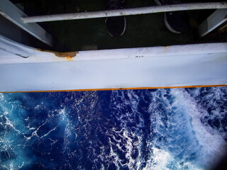 Water wake on the stern of the big ship