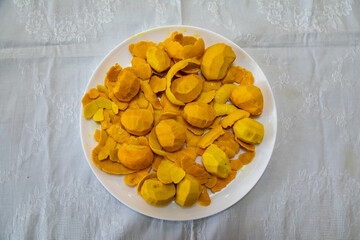 Traditional and exotic Brazilian dish rice, chicken and pequi (caryocar brasileinse) 