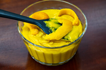 Traditional and exotic Brazilian dish rice, chicken and pequi (caryocar brasileinse) 