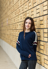 Outdoor portrait of a casual red haired 18 yo white girl, Brussels, Belgium