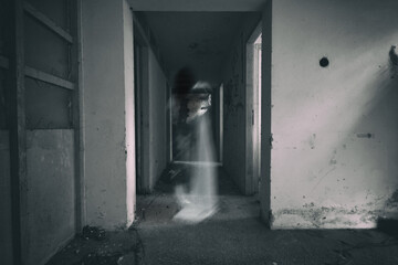 Frightening ghost of a woman in the the dilapidated room