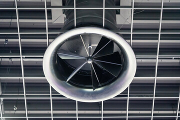Room air conditioner gray ceiling round ventilation pipe with fan blades