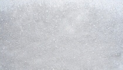 Obraz premium A frosty white snow-covered landscape with tiny specks of snowflakes