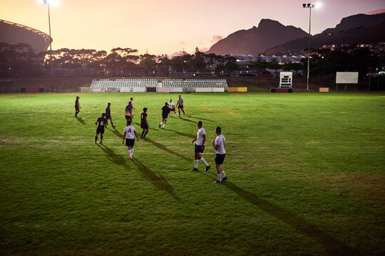 Rugby, fitness and workout with team, game and field together for match preparation or competition. Sports, health and group of athlete men outdoor with grass, club and practice with exercise