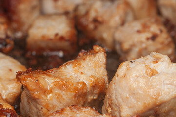Crispy, golden-brown chicken pieces are ready to eat