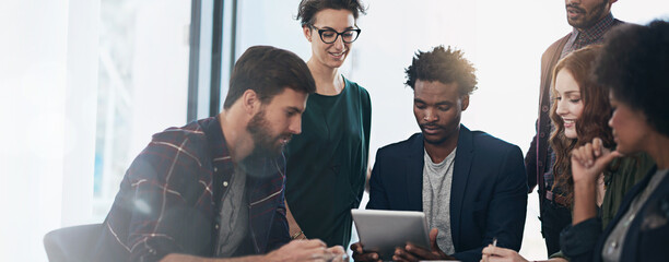 Designers, tablet or meeting in office for collaboration, project feedback or teamwork. Creative...