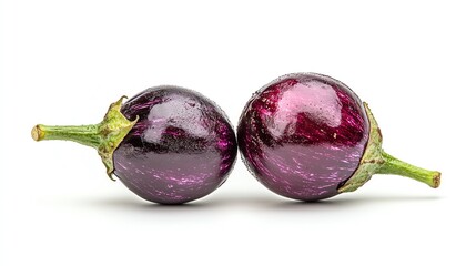 Two vibrant, glossy eggplants arranged closely, showcasing their rich purple color and smooth texture against a white background.