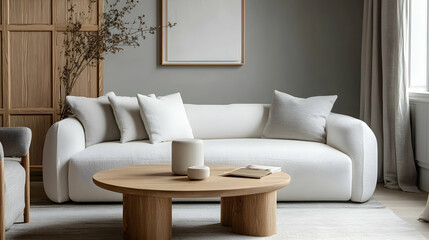 Minimalist Scandinavian Living Room with Light Gray Walls, Soft White Sofa, and Simple Wooden Coffee Table for a Serene, Airy Atmosphere