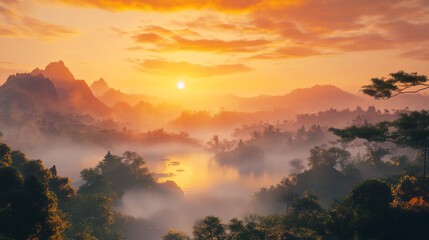 Naklejka premium A serene, misty landscape unfolds at sunrise, with the soft light casting a golden hue over the scene.