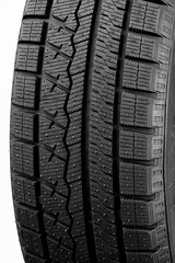 Winter car tire isolated on white background. Tyre background