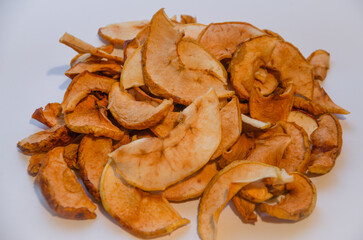 dried apples chips on a light background