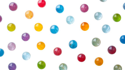 Colorful marbles arranged in a random pattern on a transparent background