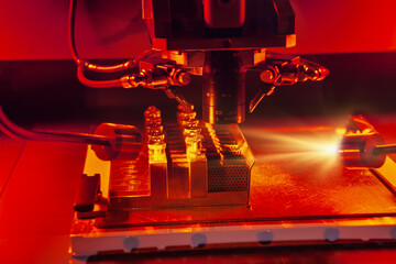 Checking gemstones using infrared spectroscopy machine, diamond cutting factory, Spectroscopy and...