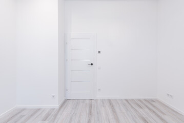 Empty white walls room corner and LED Light. Interior with empty room with white walls and wooden floor. Closed White Doors