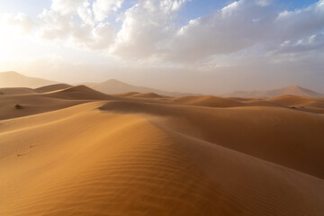 Wind blowing the sand in the Sahara Desert, Morocco, Africa.