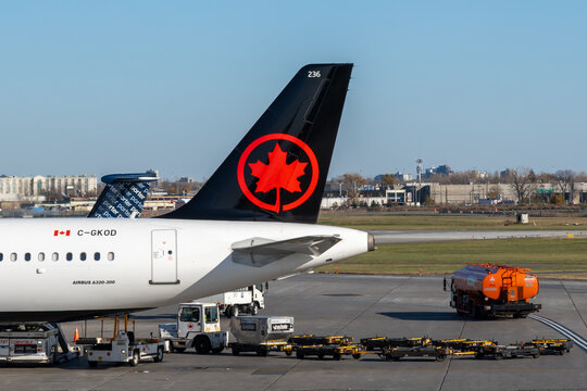 Dorval, QC, Canada - November 3, 2024: An Air Canada airplane parked at Montreal-Trudeau International Airport in Dorval, QC, Canada.