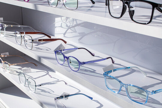 glasses correcting vision with maximum dioptrics for problems of astigmatism and myopia, made to order in a optician's workshop on the shelf of a store selling goods for vision and contact lenses
