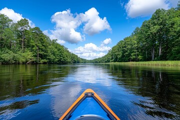 Pearl River in St. Tammany Parish, Louisiana lined with green trees