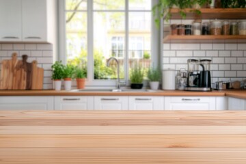 Empty wooden table top sits on blurred background of modern kitchen interior