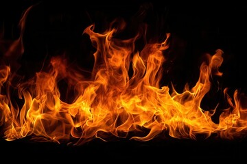 Fiery flames creating a texture or pattern on a black background for design and decoration