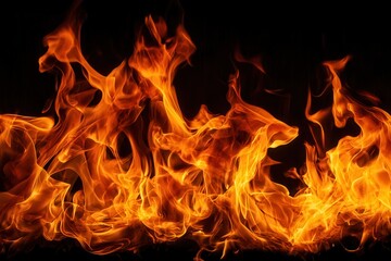 Fiery flames creating a texture or pattern on a black background