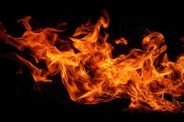 Fototapeta premium Fiery flames creating dynamic texture on black background