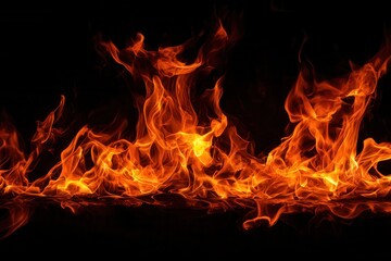 Blazing fire flames creating a dramatic texture on black background