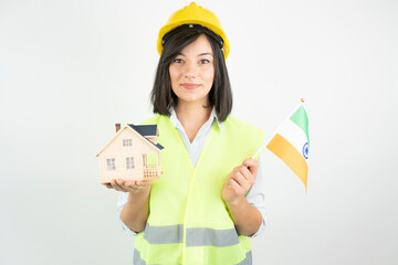 Home inspector woman or engineer holding indian flag and detached house model