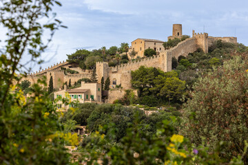 Fototapeta premium The Castle of Capdepra on the hill above the small town of Capdepera, Mallorca, Majorca, Balearic Islands, Spain, Europe