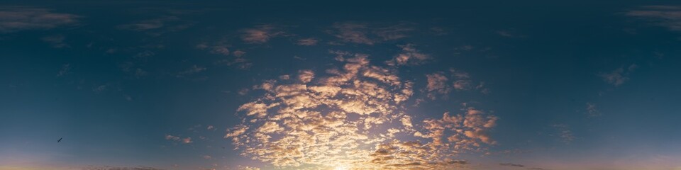 360 panorama of glowing sunset sky with bright pink Cumulus clouds. HDR 360 seamless spherical panorama. Full zenith or sky dome sky replacement for aerial drone panoramas. Climate and weather change.