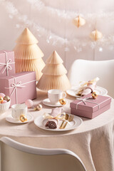 Stunning Christmas tableware for two with bubbles and gifts.