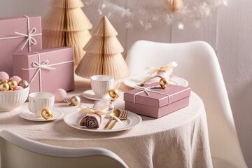 Stunning Christmas tableware for two with baubles and decorations.