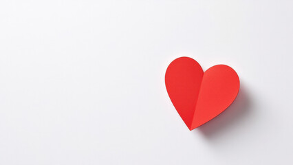 Red heart shape on white background, symbolizing love and affection