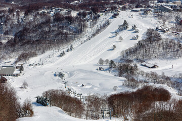 Groomed pistes and ski runs at the Japanese ski resort of Madarao in Nagano prefecture.