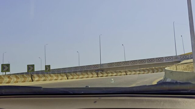 A view of a road with a sign on it