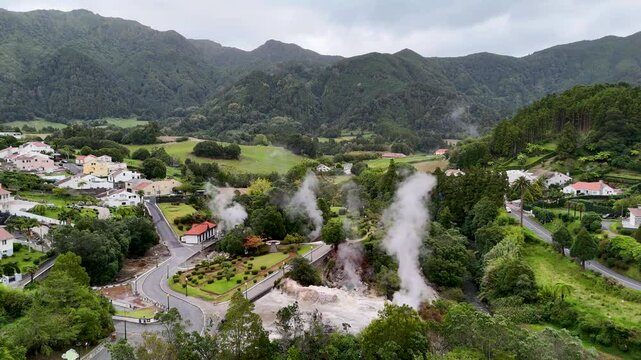Furnas village with hot thermal springs aerial 4K drone video footage, Sao Miguel Island, Azores, Portugal. Caldeira do Asmodeu