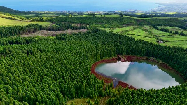 Aerial 4K drone video footage of Lagoa do Canario in Sao Miguel Island, Azores, Portugal. Aerial drone view of panoramic Acores islands