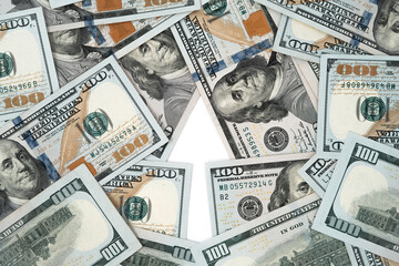 A creative photo of U.S. one-hundred-dollar bills forming an arrow pointing to the top with...