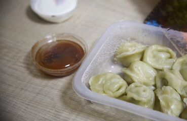 dumplings with sauce on the table