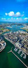 Obraz premium Aerial view of Poole, a coastal town in Dorset, southern England, known for its large natural harbour and sandy beaches