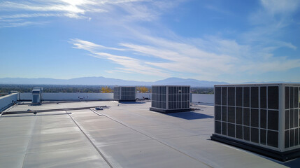High quality photo of outdoor AC units on rooftop with clear blue sky and distant mountains. scene conveys sense of tranquility and modernity in urban architecture