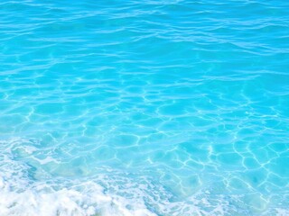 Obraz premium Minimalist and abstract background of beautiful blue waves on water surface, abstract, sea