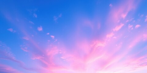 Obraz premium Vibrant pink cloud contrasting with bright blue sky, colorful, pink