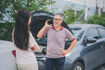 parties are quarreling due to a car accident while waiting for the insurance agent to clear it.