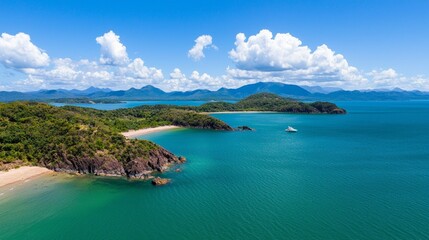 Aerial view of serene coastline with lush green islands under a bright blue sky.