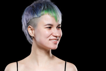 Naklejka premium Beautiful young woman with stylish short haircut and colored hair dyeing - blue-green hair.