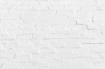 Texture old brick wall painted with white paint. Architecture.
