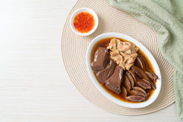 stewed duck offal in brown soup