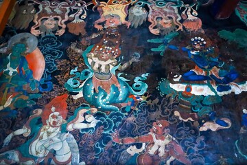 Vivid wall painting at the historic Nechung Monastery, the seat of the Nechung Oracle in Lhasa,...