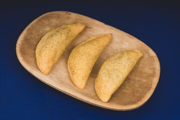 Delicious traditional Colombian empanadas with spicy sauce